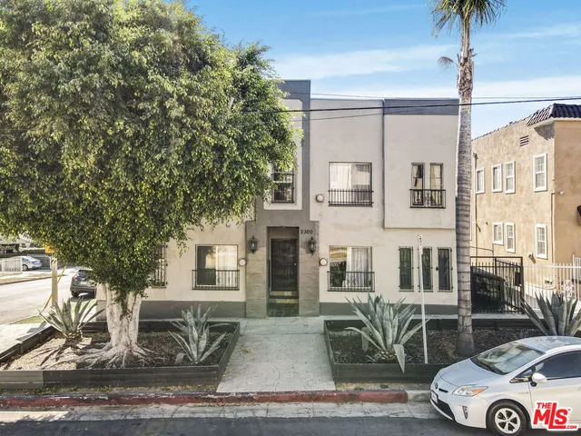 an aerial view of a city with lots of residential buildings