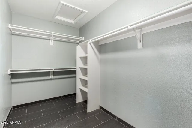 a storage room with washer and dryer