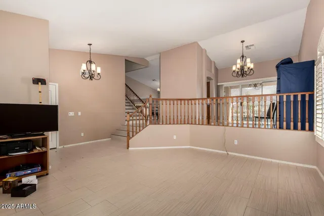 a view of livingroom with furniture and flat screen tv