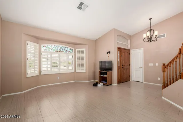a view of livingroom with furniture and windows