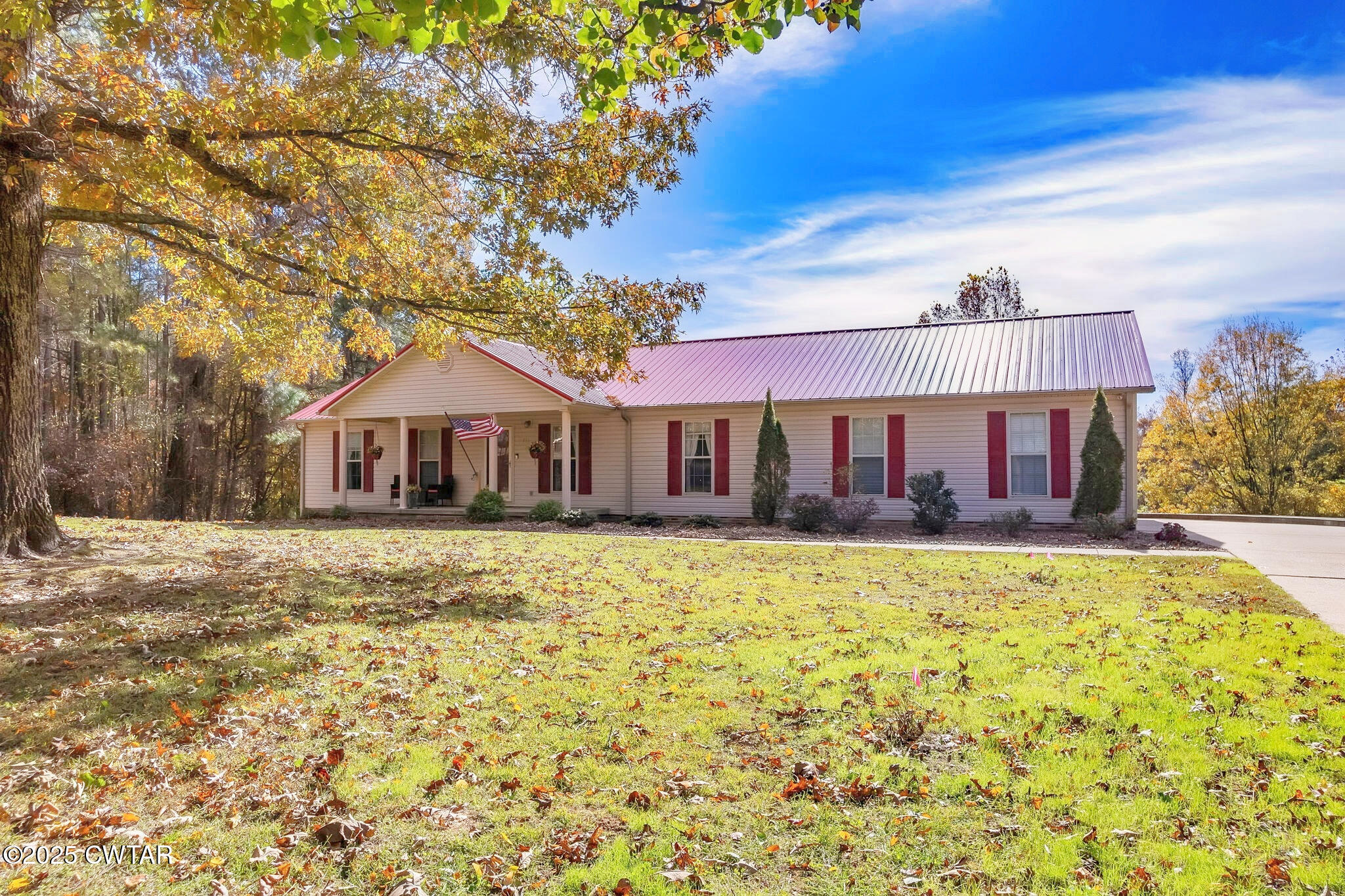 a front view of a house with yard patio and balcony