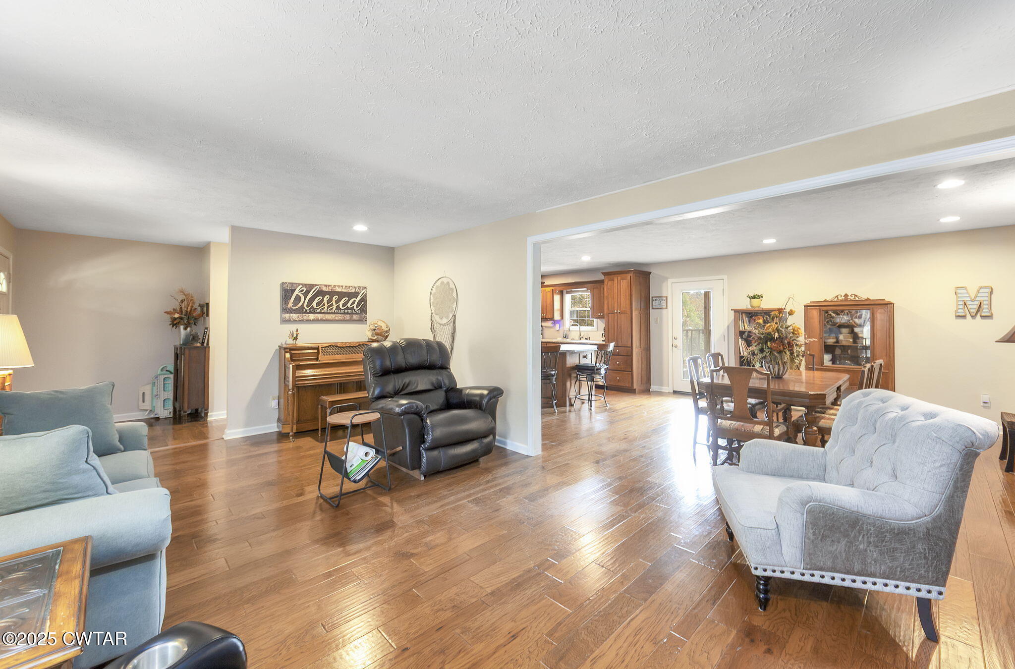 715 Pine Ridge Road Lexington, TN 38351 - Photo 13 of 49 a living room with furniture and wooden floor