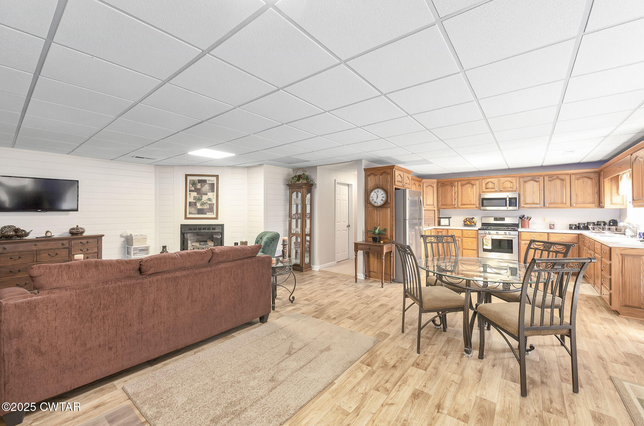 715 Pine Ridge Road Lexington, TN 38351 - Photo 16 of 49 a living room with furniture and a flat screen tv