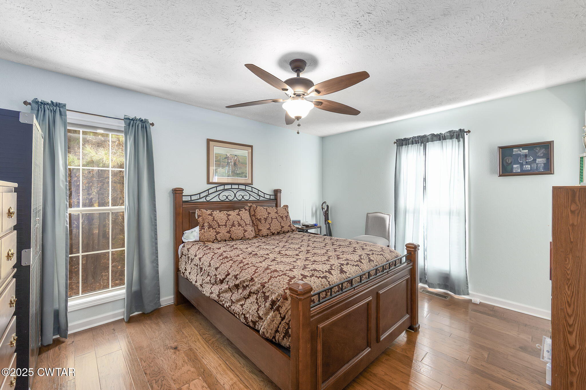 715 Pine Ridge Road Lexington, TN 38351 - Photo 17 of 49 a bedroom with a bed and a large window