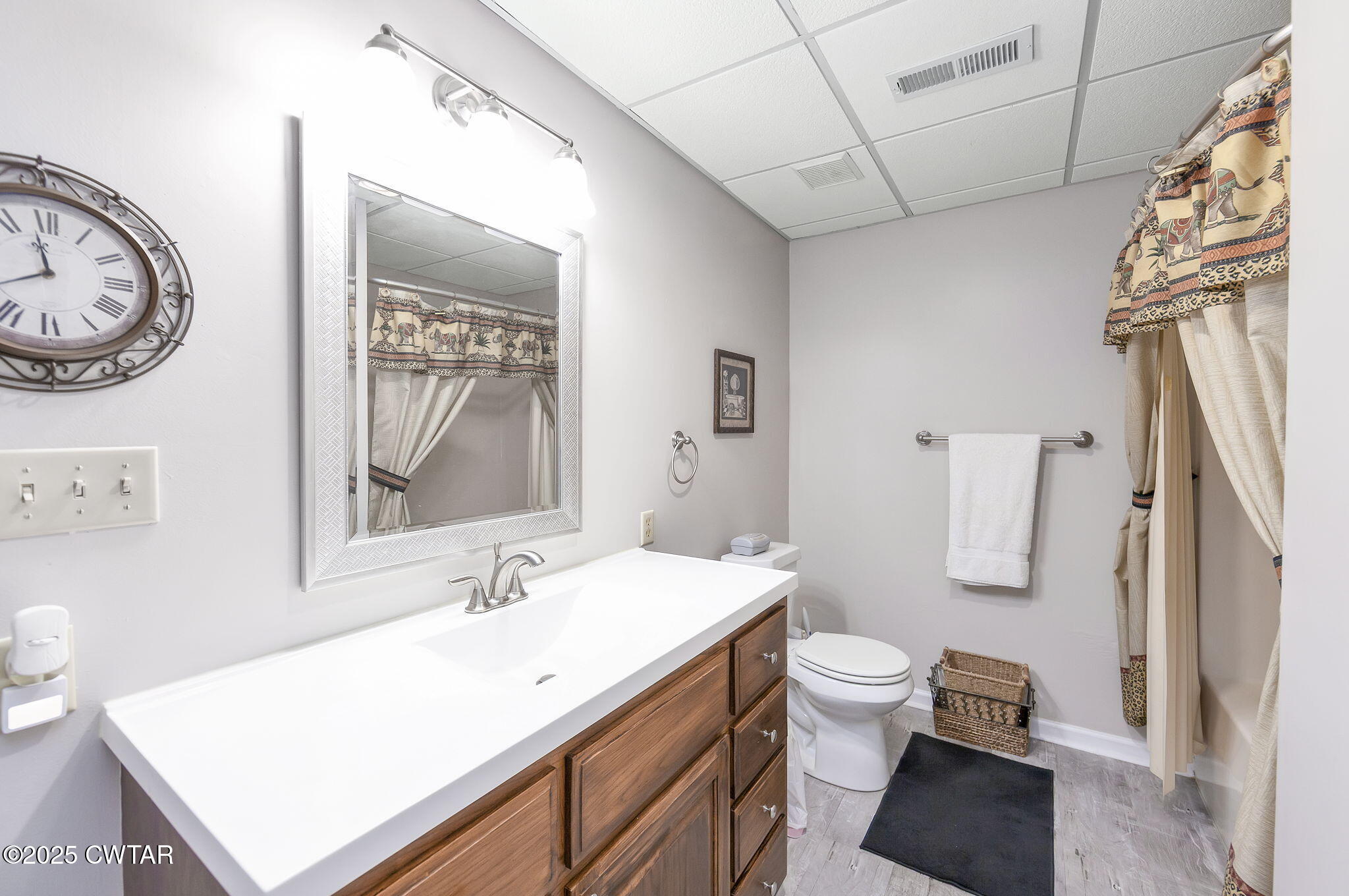 715 Pine Ridge Road Lexington, TN 38351 - Photo 26 of 49 a bathroom with a sink a toilet and a mirror