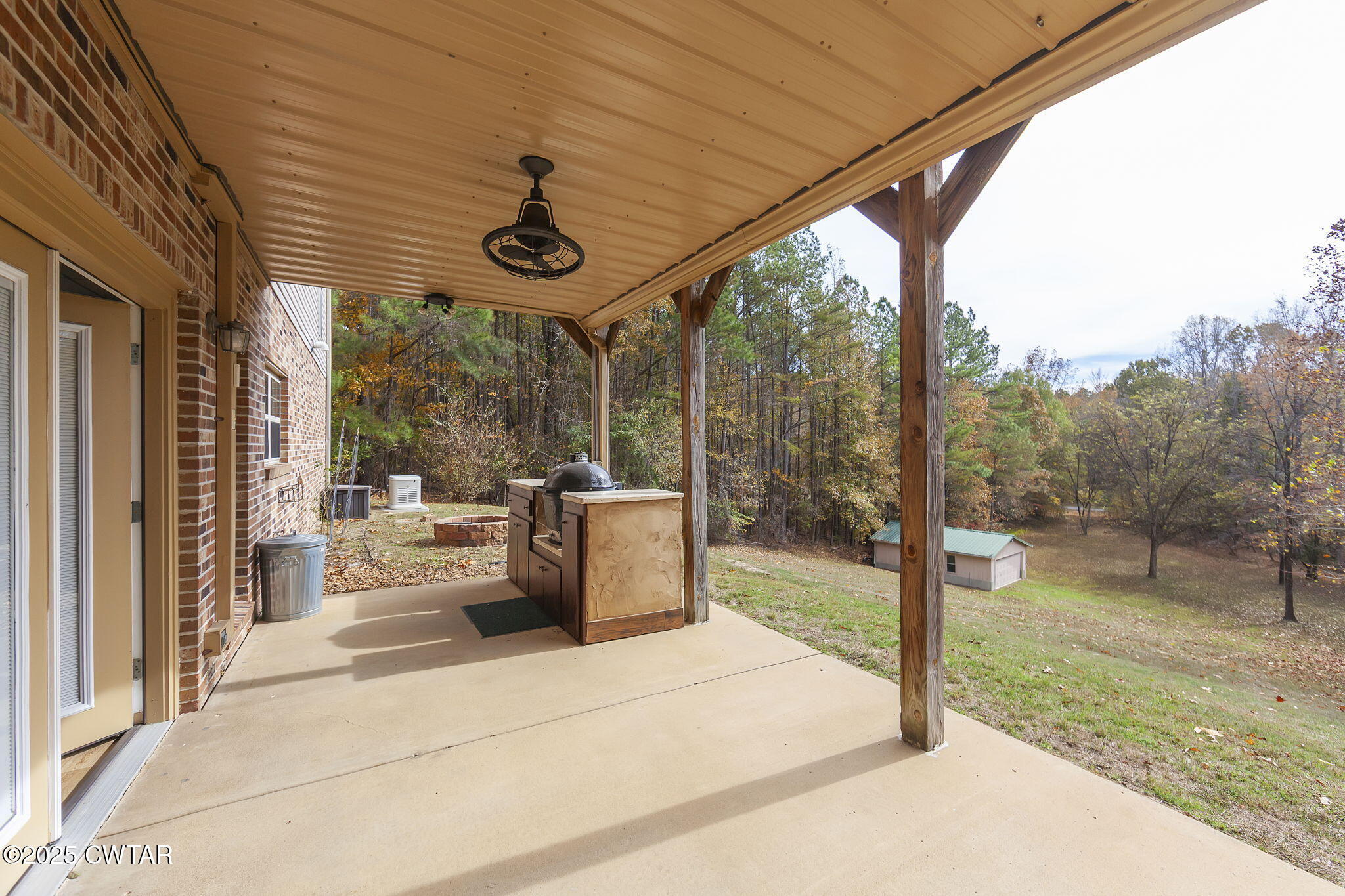715 Pine Ridge Road Lexington, TN 38351 - Photo 29 of 49 a view of a porch with furniture and wooden deck