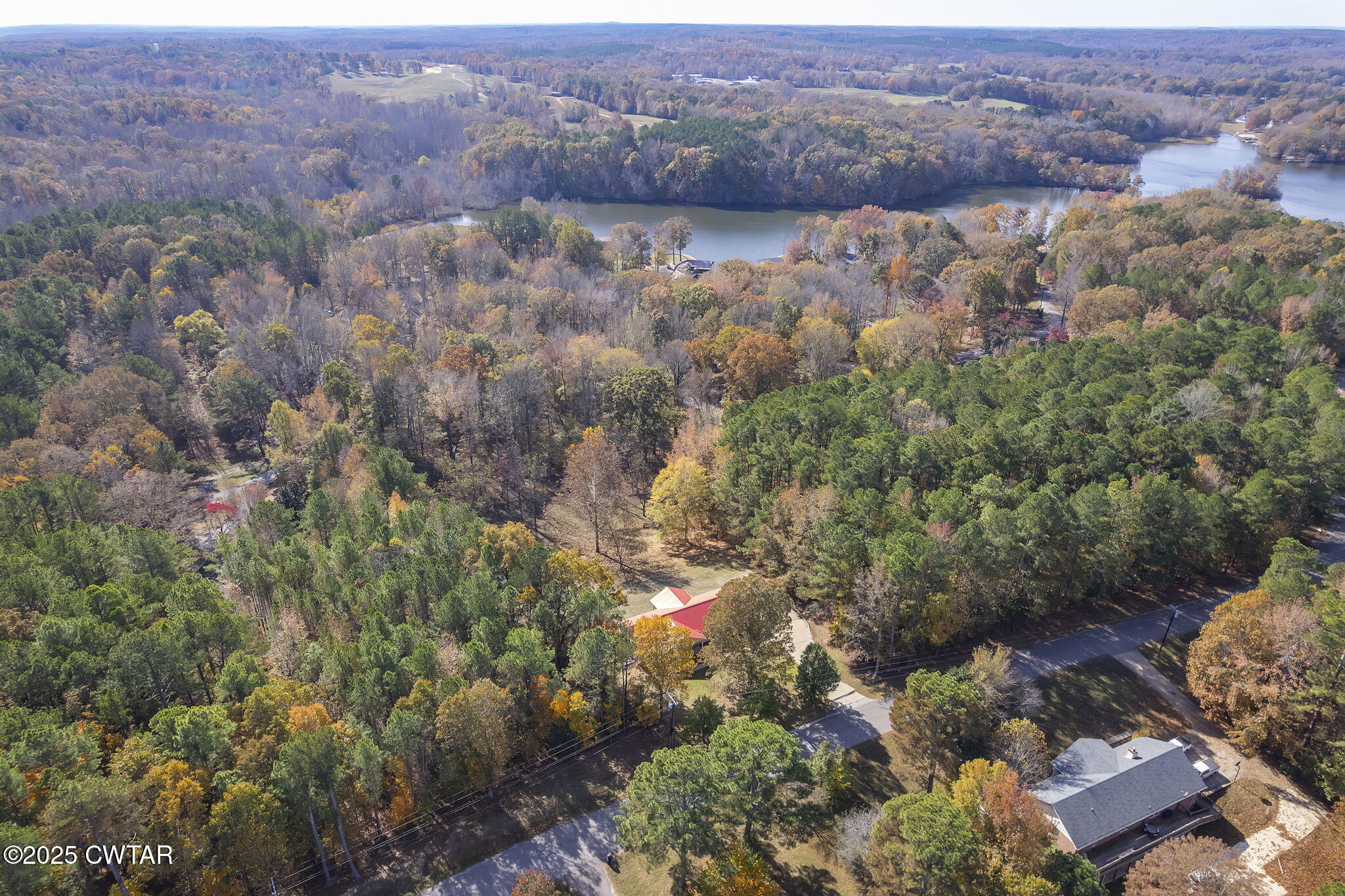 715 Pine Ridge Road Lexington, TN 38351 - Photo 48 of 49 an aerial view of residential house with outdoor space and trees all around