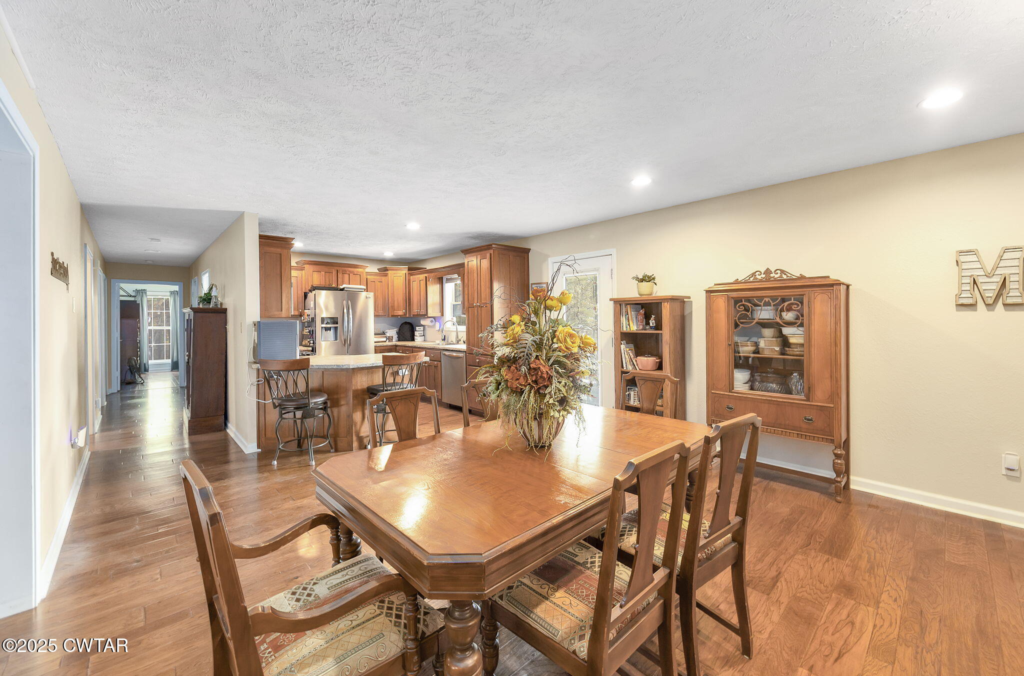 715 Pine Ridge Road Lexington, TN 38351 - Photo 7 of 49 a view of a dining room with furniture and wooden floor