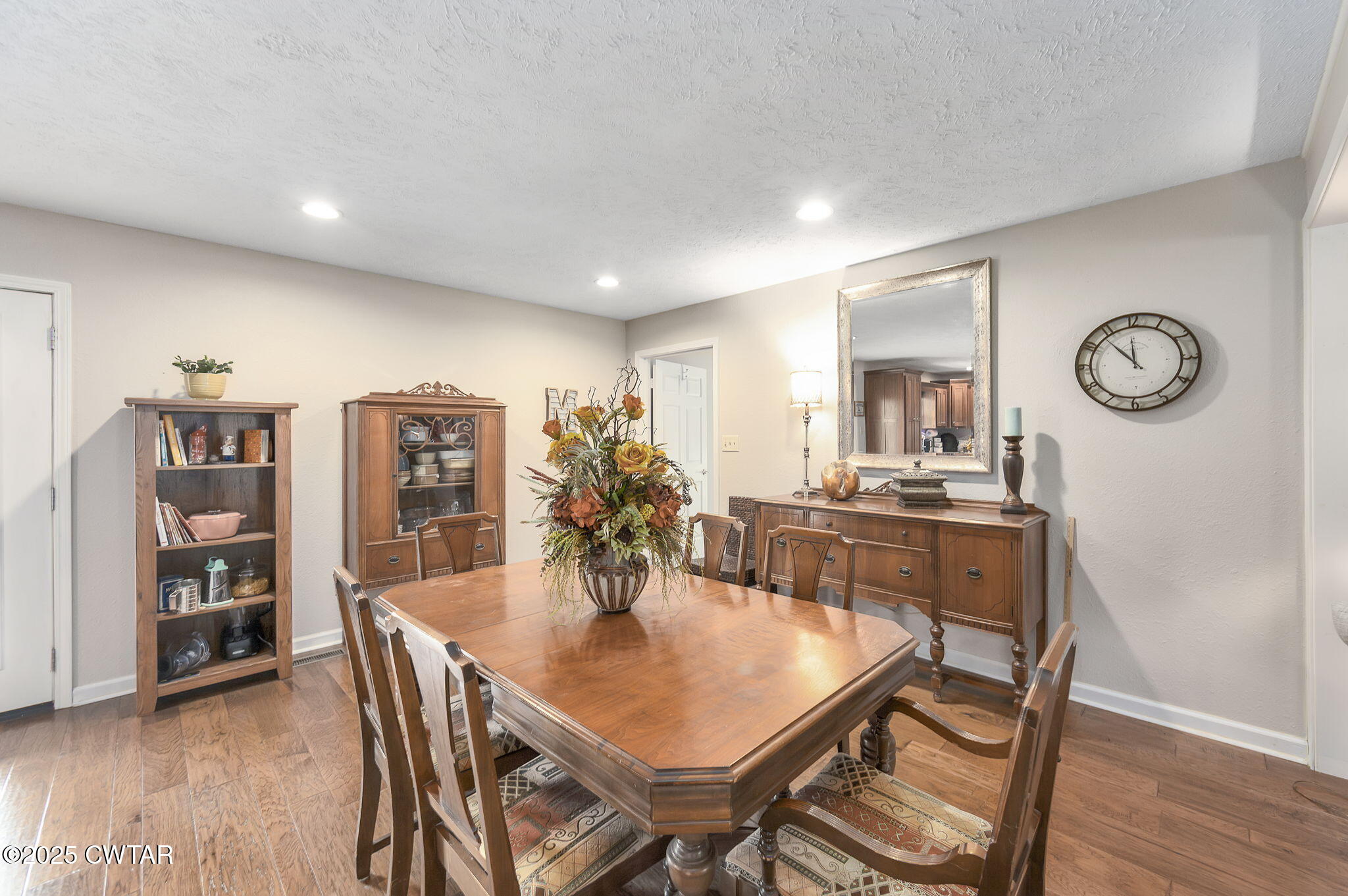 715 Pine Ridge Road Lexington, TN 38351 - Photo 9 of 49 a view of a dining room with furniture and wooden floor