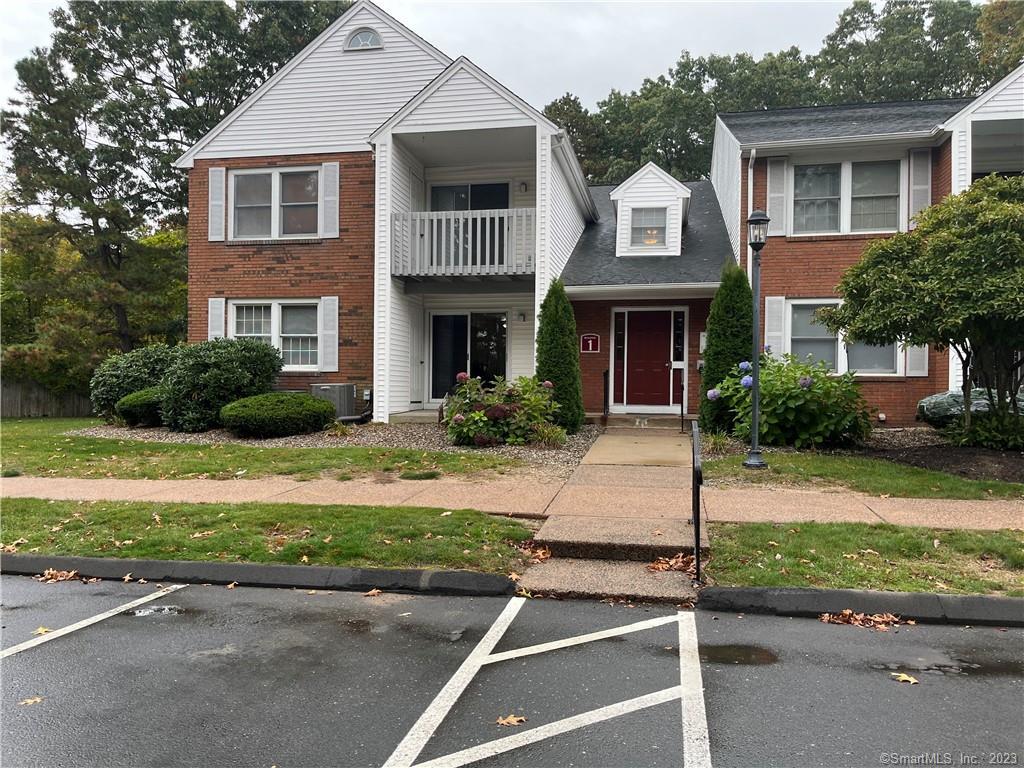 1 Concorde Way, Unit A1 Windsor Locks, CT 06096 - Photo 1 of 1 a front view of a house with garden