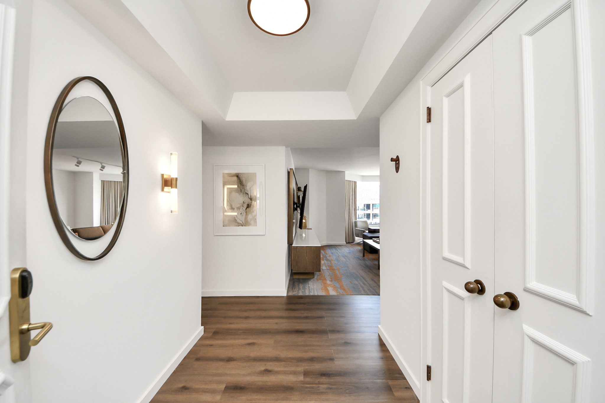 1300 Lamar Street, Unit S8 Houston, TX 77010 - Photo 2 of 50 a view of a room with wooden floor and white walls