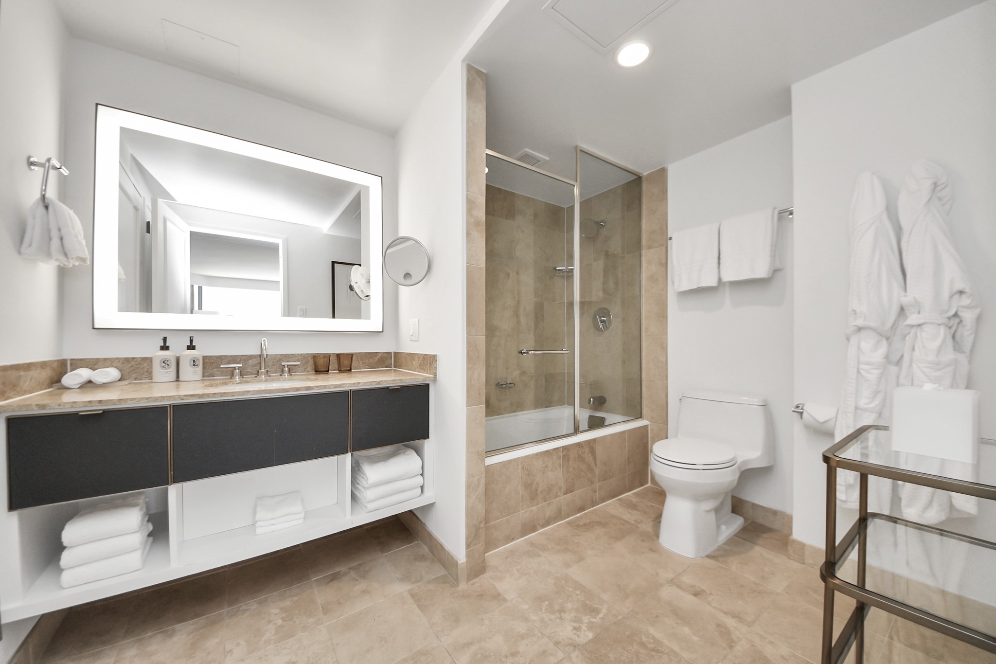 1300 Lamar Street, Unit S8 Houston, TX 77010 - Photo 38 of 50 a bathroom with a sink a toilet and a bathtub
