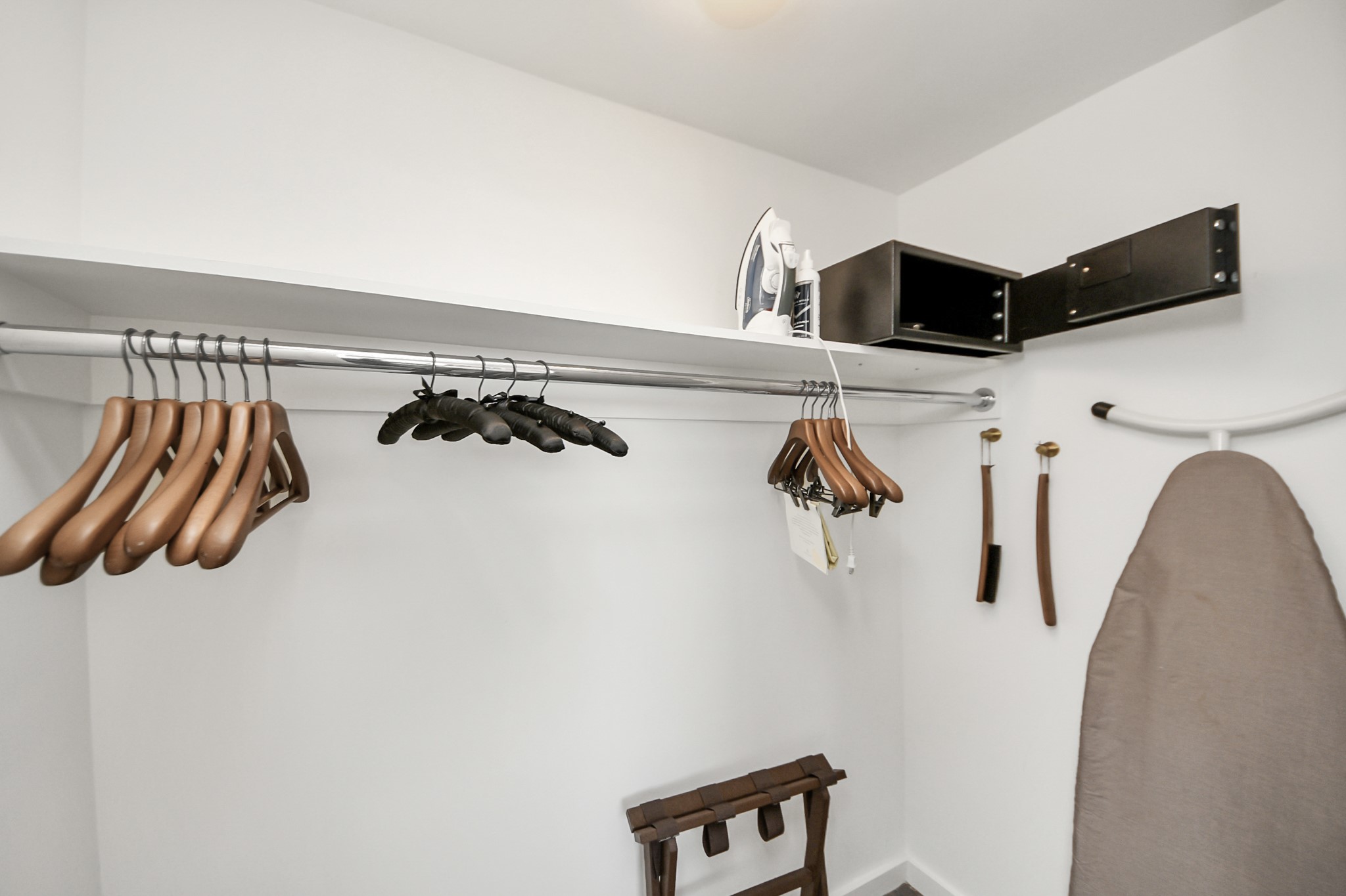 1300 Lamar Street, Unit S8 Houston, TX 77010 - Photo 43 of 50 a view of walk in closet with clothes and shoes