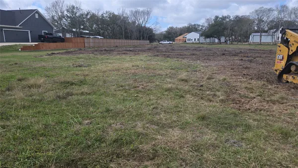 a view of outdoor space with deck and yard