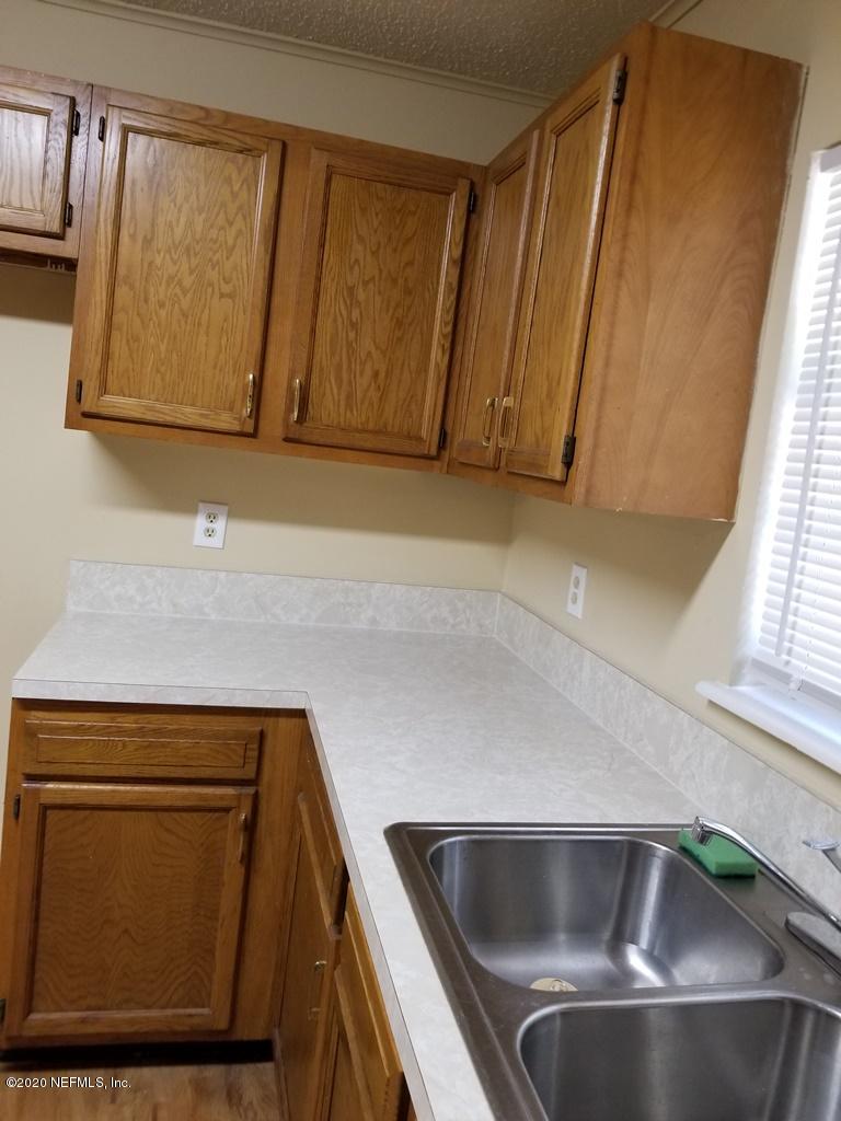 5449 Foxboro Road, Unit 7 Jacksonville, FL 32208 - Photo 7 of 37 20200322_115105