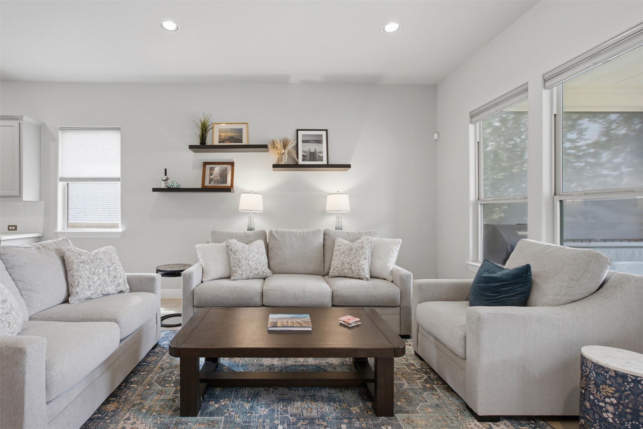 1113 Modoc Way Kyle, TX 78640 - Photo 13 of 34 Recessed lighting illuminates this inviting living space, perfect for comfortable gatherings.