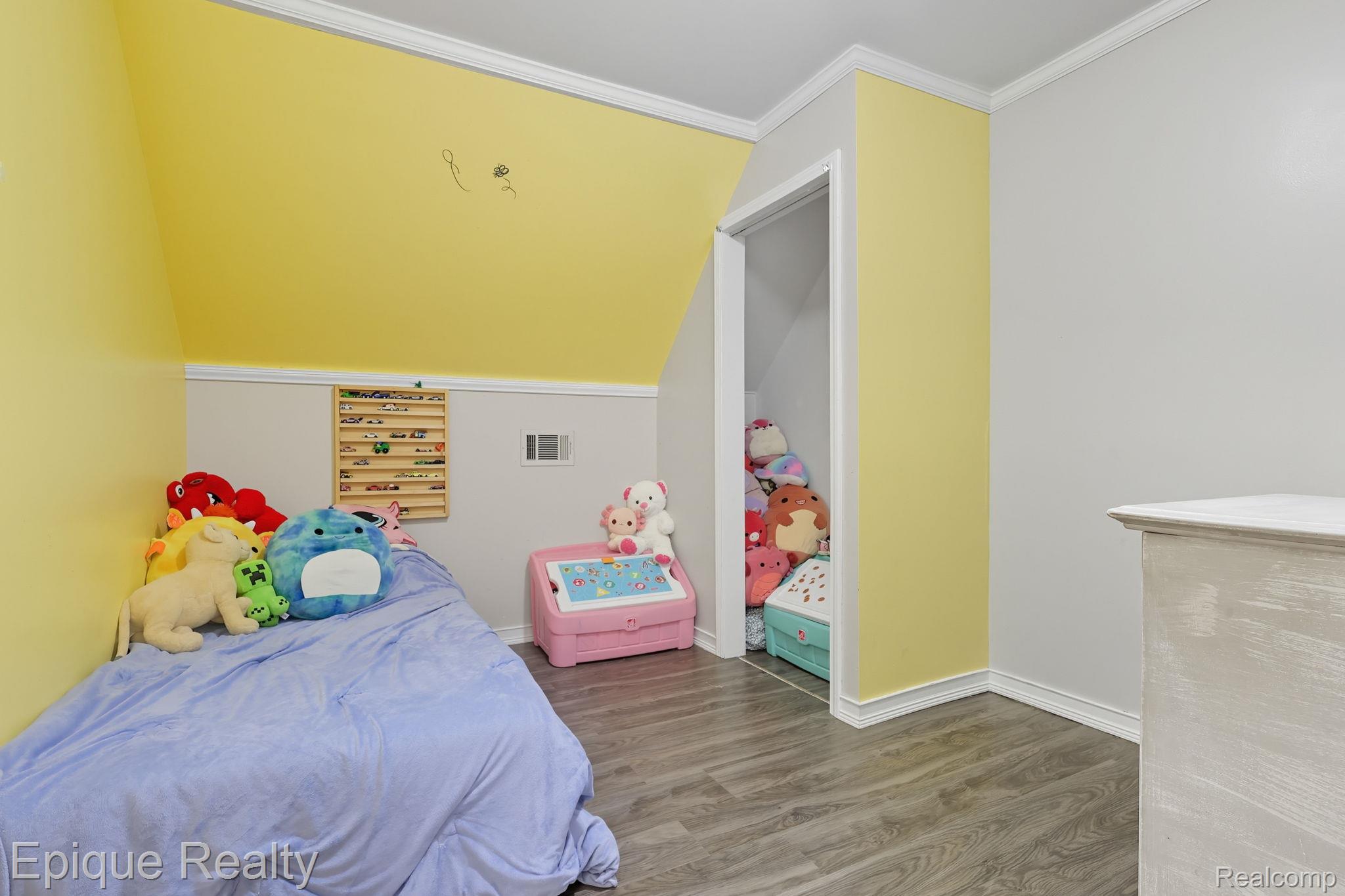 13265 Tibbets Road Memphis, MI 48041 - Photo 11 of 48 Bedroom featuring ornamental molding and wood finished floors