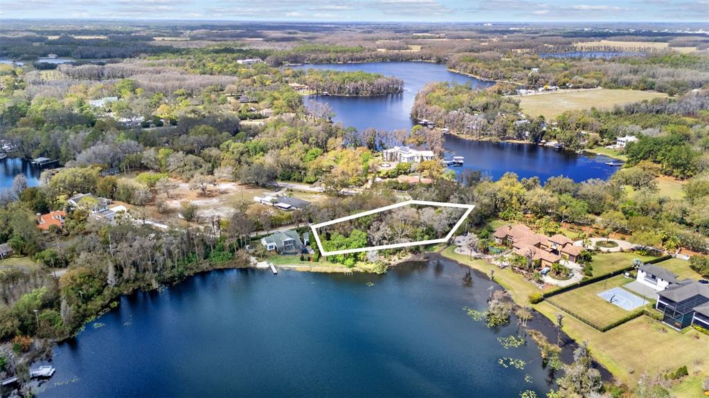 18709 Wayne Road Odessa, FL 33556 - Photo 34 of 34 an aerial view of a house with a ocean view