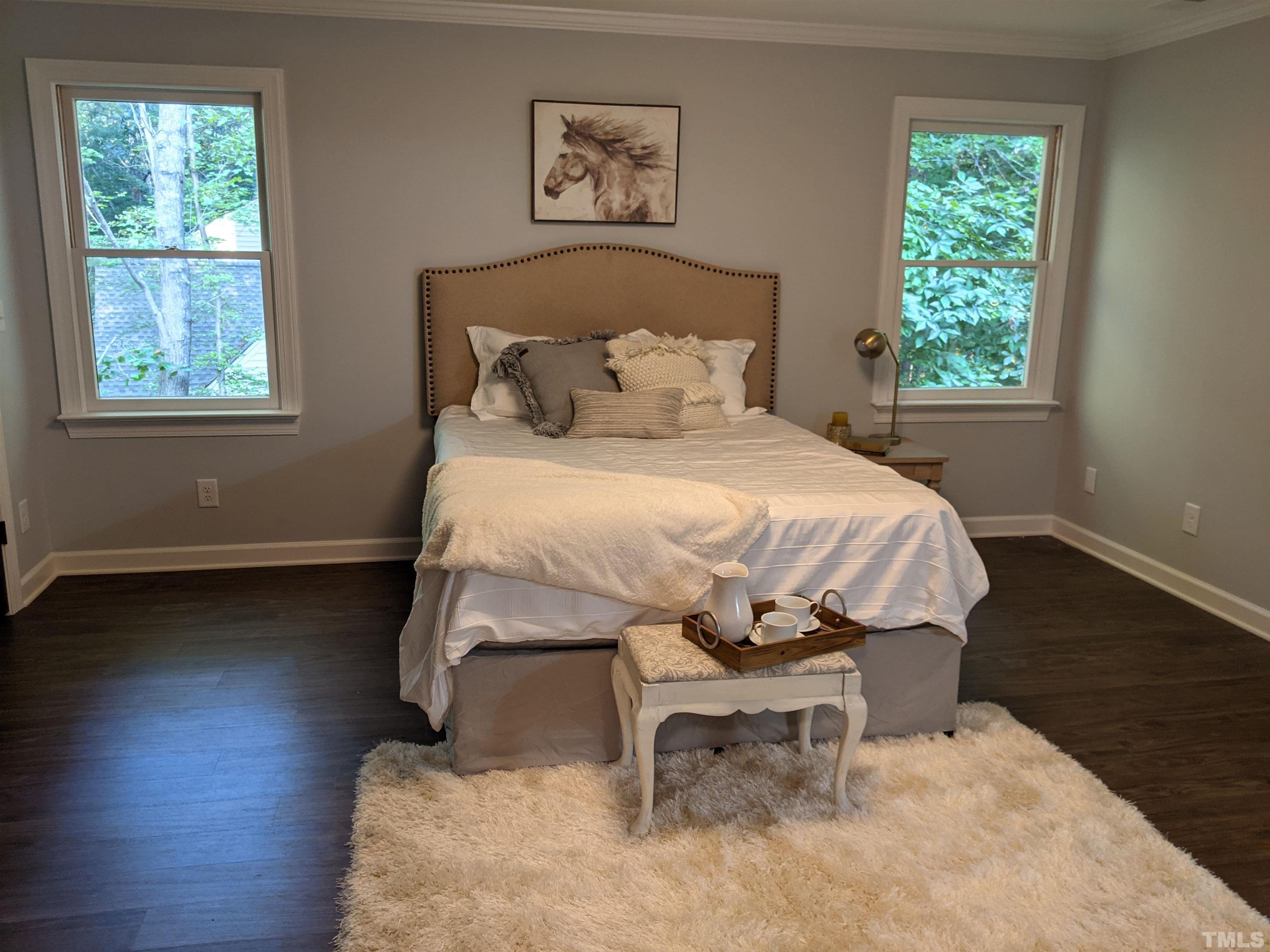 213 Trotters Ridge Drive Raleigh, NC 27614 - Photo 14 of 28 a bedroom with a bed and a window