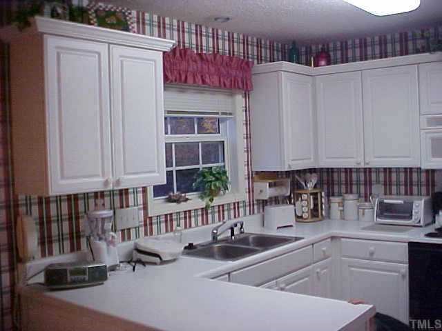 1129 Pilton Place Raleigh, NC 27604 - Photo 5 of 9 Pretty kitchen w/lots of cabinets.