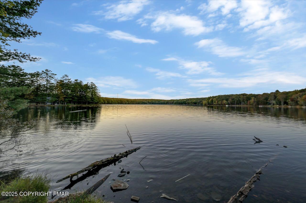 437 Westcolang Road Hawley, PA 18428 - Photo 98 of 108 a view of a lake with houses