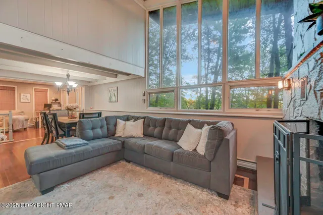 a bedroom with a bed and a tv