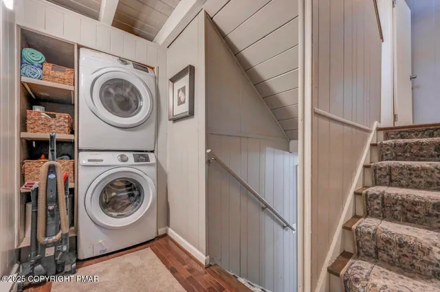 a view of backyard of house with green space