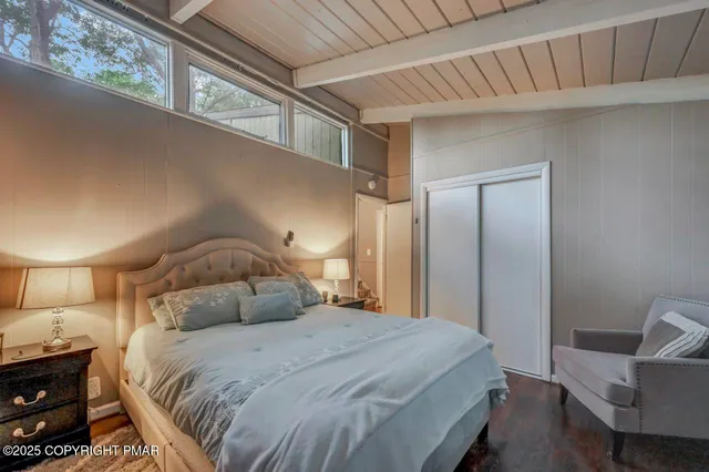 a kitchen with stainless steel appliances granite countertop a stove a sink and a granite counter tops with garden view