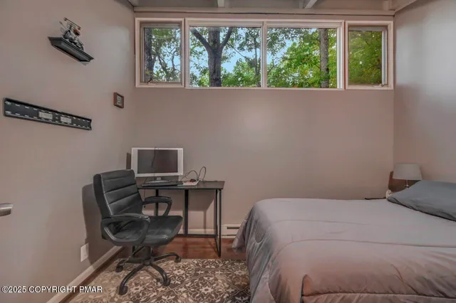 front view of a house with a large yard