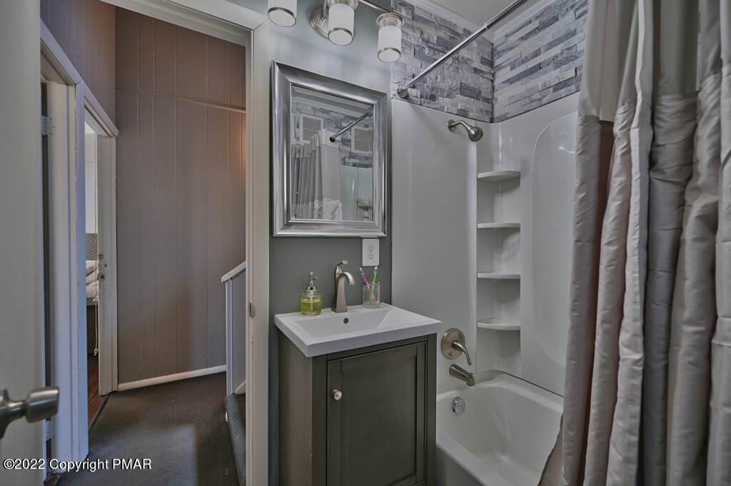 437 Westcolang Road Hawley, PA 18428 - Photo 35 of 108 a bathroom with a sink toilet and shower