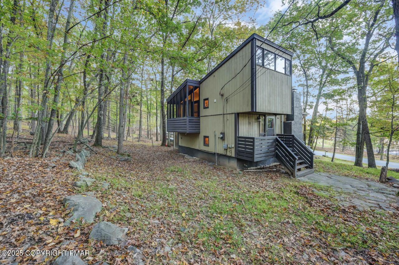 437 Westcolang Road Hawley, PA 18428 - Photo 40 of 108 a view of backyard of house with green space