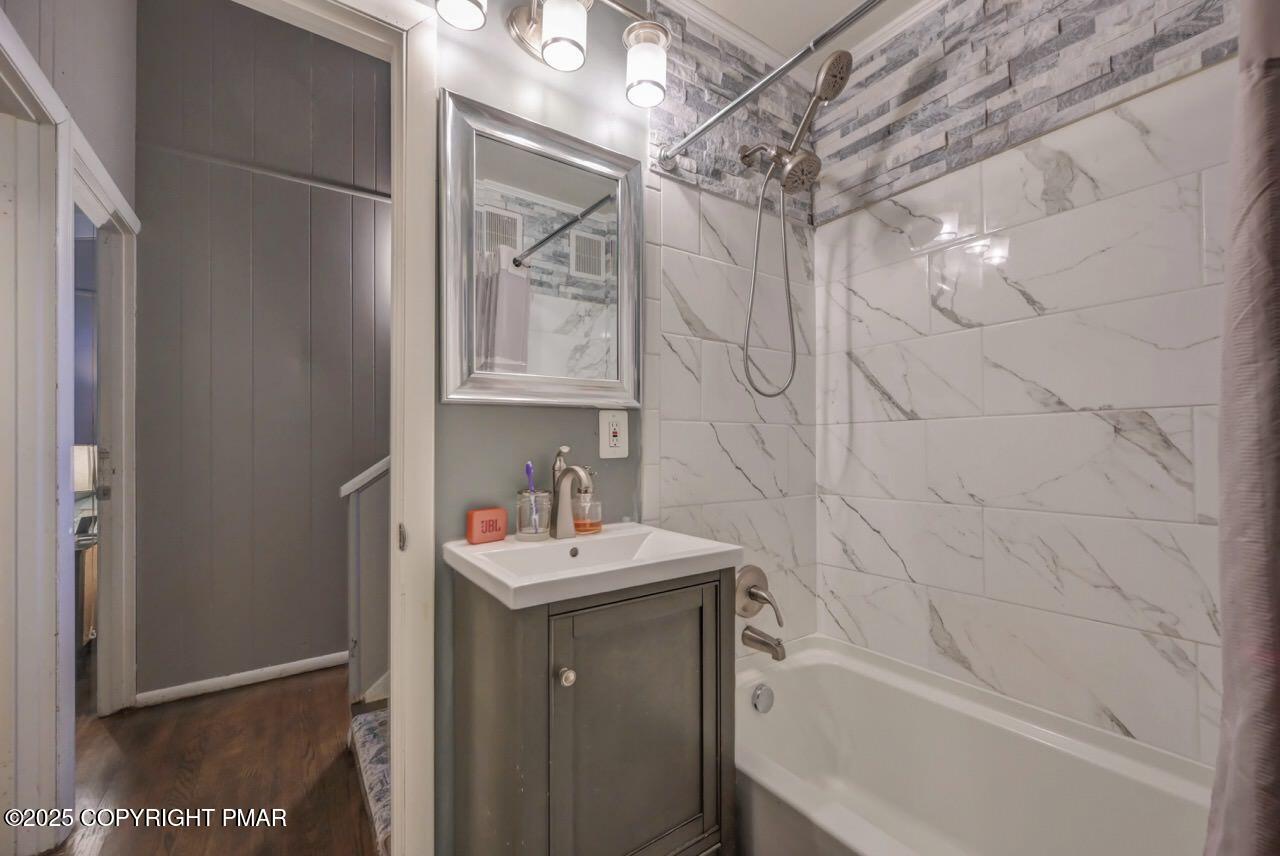 437 Westcolang Road Hawley, PA 18428 - Photo 65 of 108 a bathroom with a sink a toilet and shower