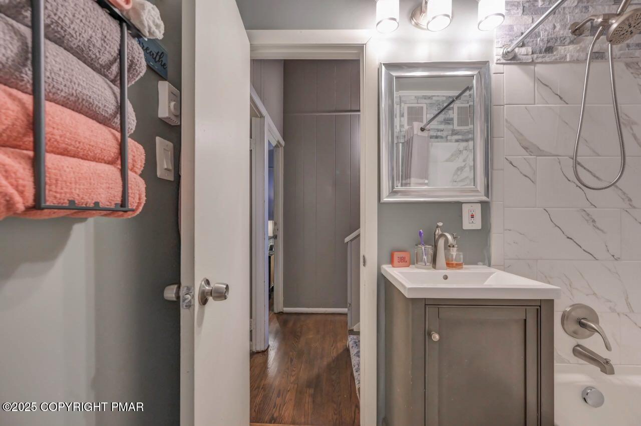 437 Westcolang Road Hawley, PA 18428 - Photo 66 of 108 a bathroom with a sink and a mirror