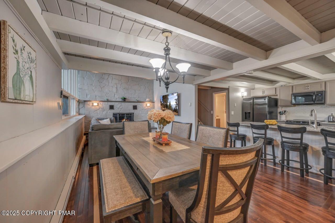 437 Westcolang Road Hawley, PA 18428 - Photo 8 of 108 a view of a dining room with furniture window and wooden floor