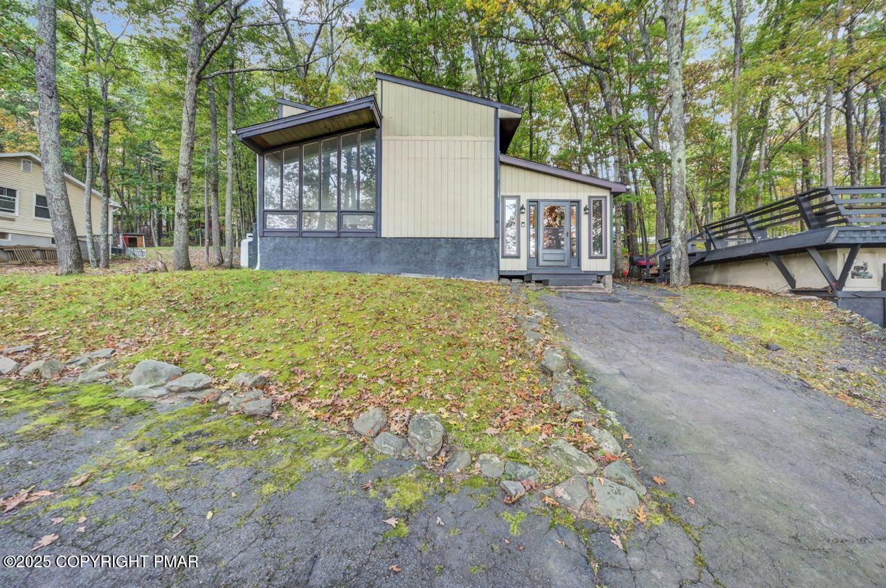 437 Westcolang Road Hawley, PA 18428 - Photo 78 of 108 front view of a house with a large yard
