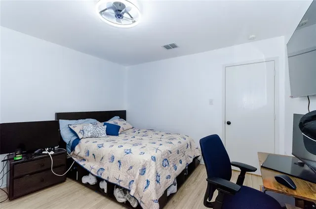 a view of a wooden deck with a yard