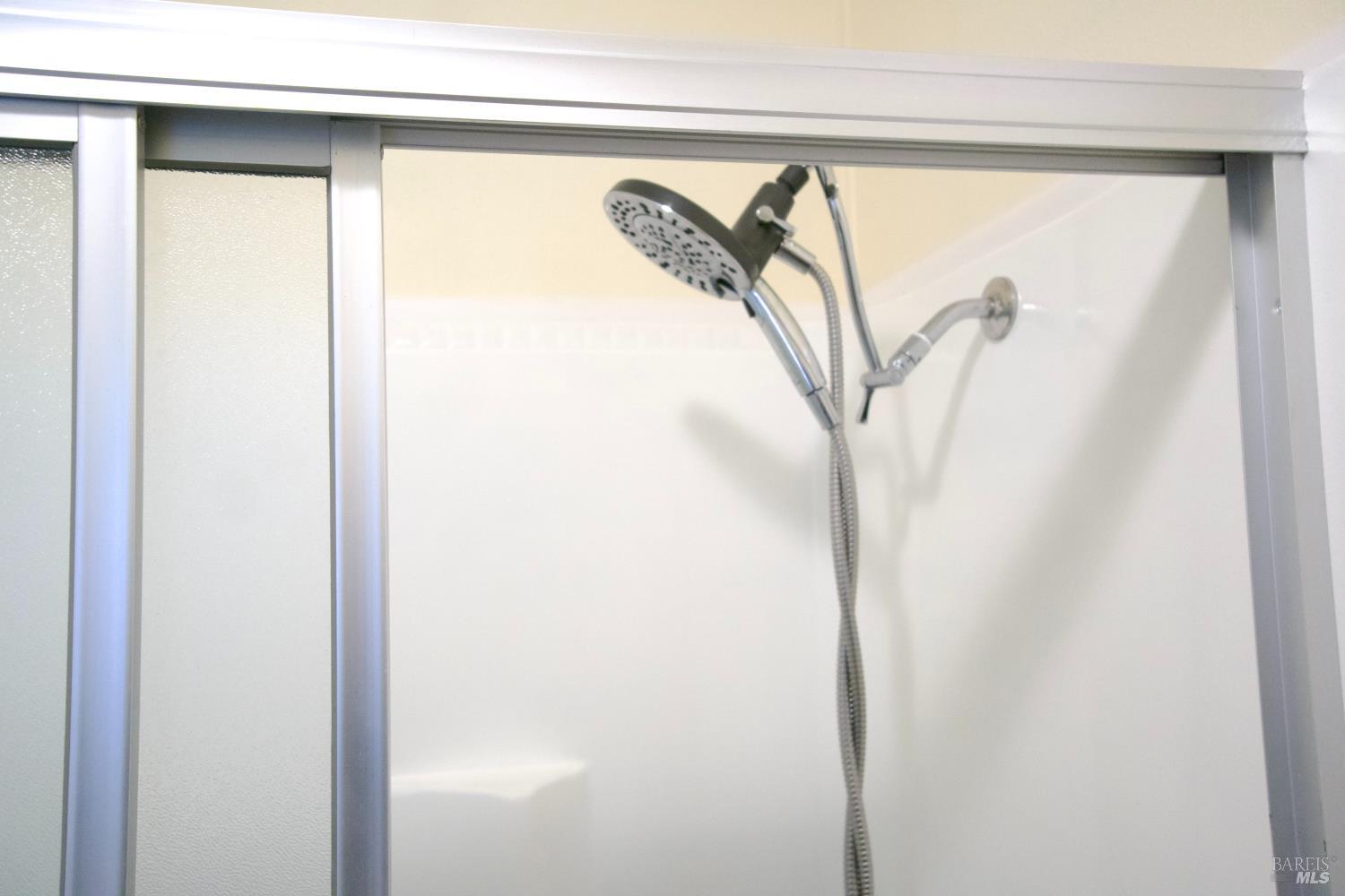 41 Plymouth Way Santa Rosa, CA 95403 - Photo 26 of 28 Shower head in the step-in shower in the hall bath