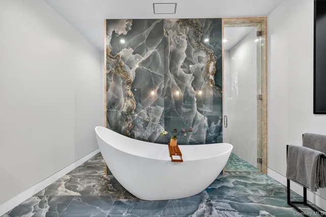 a bathroom with a sink double vanity and a mirror