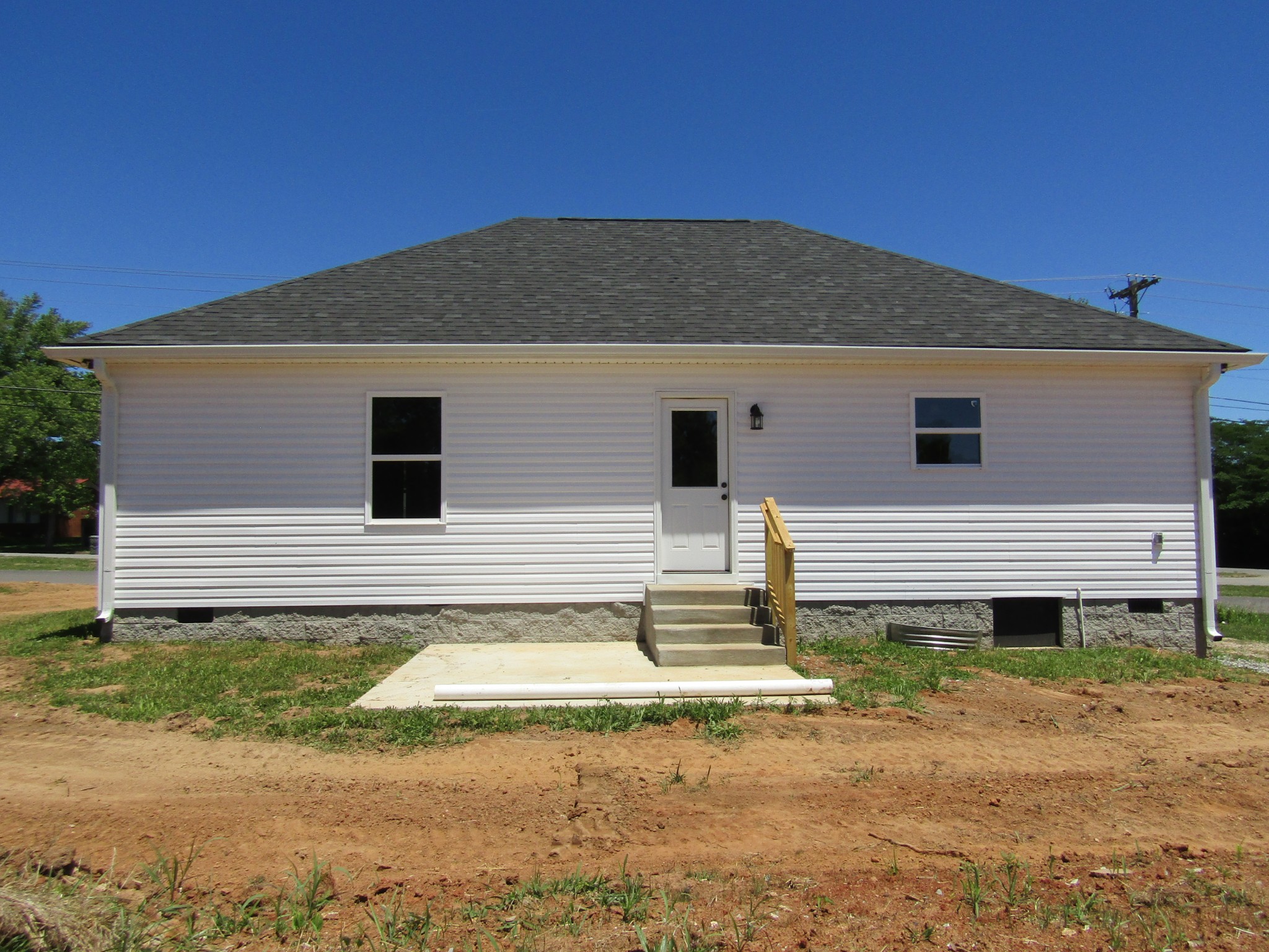460 Crescent Factory Road Lawrenceburg, TN 38464 - Photo 2 of 13 a view of a house with backyard