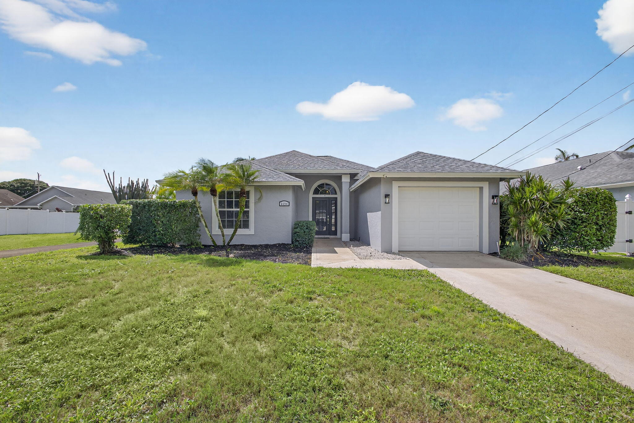 6394 Drake Street Jupiter, FL 33458 - Photo 1 of 54 4-web-or-mls-004_5D1A8277