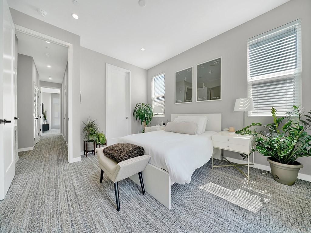 604 Malibu Costa Mesa, CA 92627 - Photo 21 of 40 a living room with furniture and a potted plant