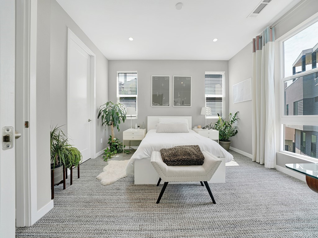604 Malibu Costa Mesa, CA 92627 - Photo 23 of 40 a living room with furniture and a potted plant