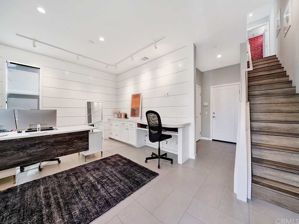 604 Malibu Costa Mesa, CA 92627 - Photo 3 of 40 a kitchen with a sink and a stove top oven
