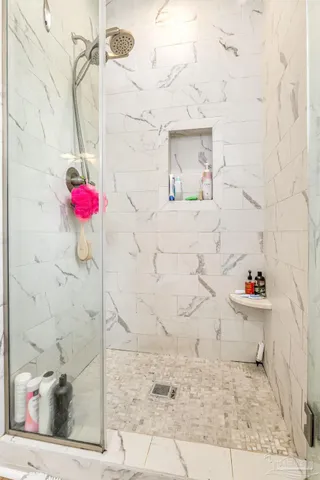 a bathroom with a sink and a shower