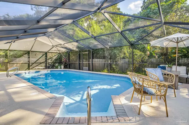 a view of outdoor space with swimming pool