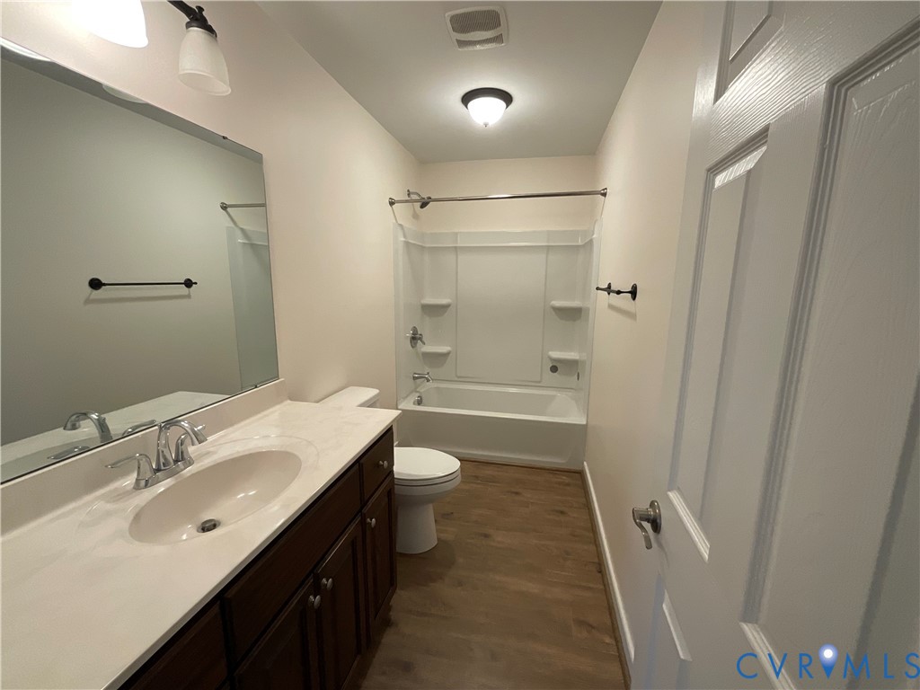 400 Elsassar Road King William, VA 23086 - Photo 17 of 31 a bathroom with a double vanity sink mirror double shower and a bathtub