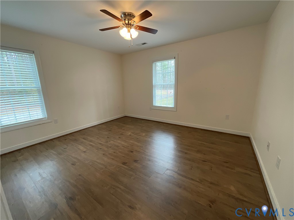 400 Elsassar Road King William, VA 23086 - Photo 18 of 31 a view of an empty room with wooden floor and a window