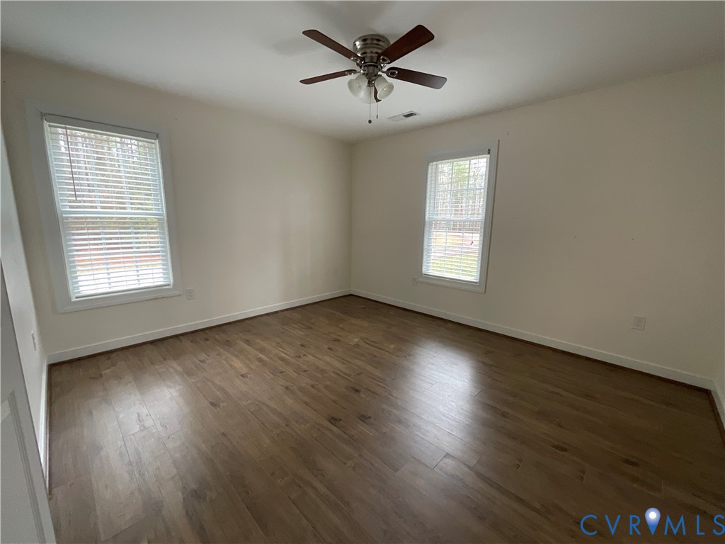 400 Elsassar Road King William, VA 23086 - Photo 19 of 31 an empty room with wooden floor and windows