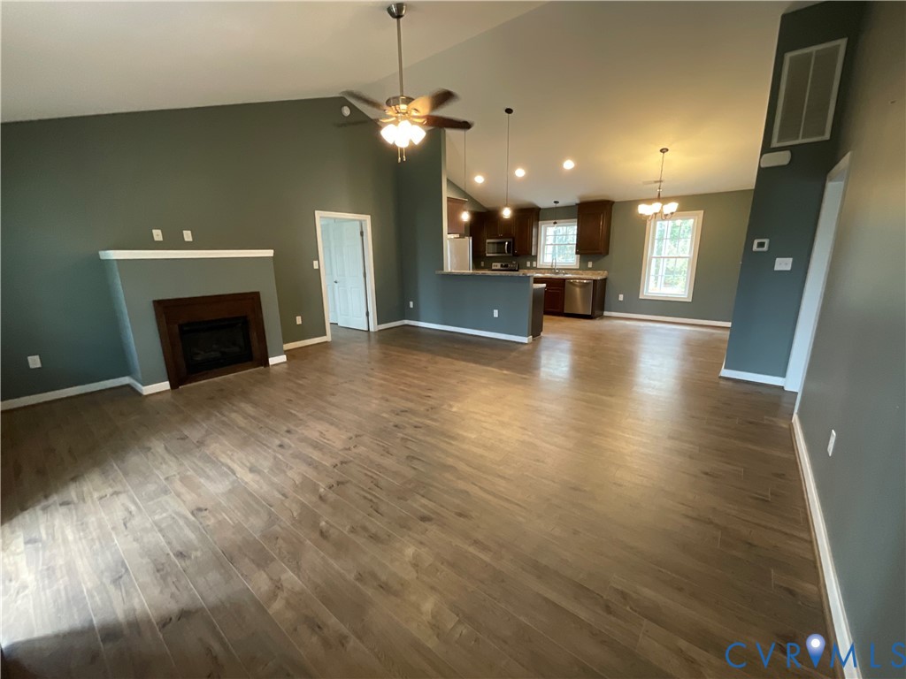 400 Elsassar Road King William, VA 23086 - Photo 5 of 31 a view of a livingroom with a fireplace a sink and a fireplace