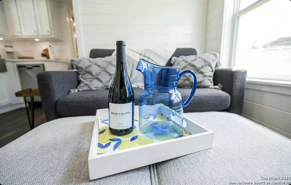 5386 Ranch Road 1376, Unit 97 Fredericksburg, TX 78624 - Photo 10 of 27 a living room with furniture and a window